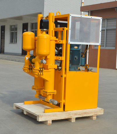 Grout pump for injecting microcement