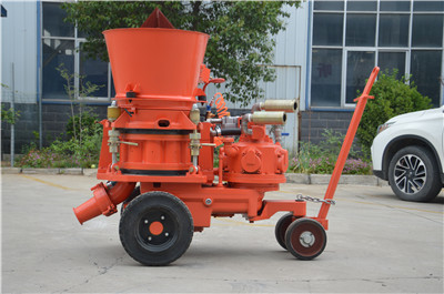 Refractory gunite machine