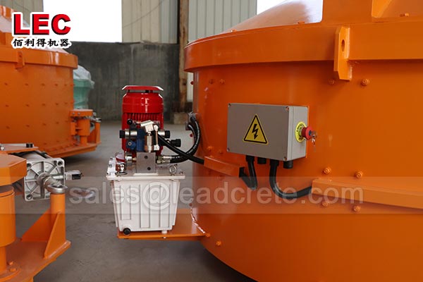 Automatic self loading concrete mixer