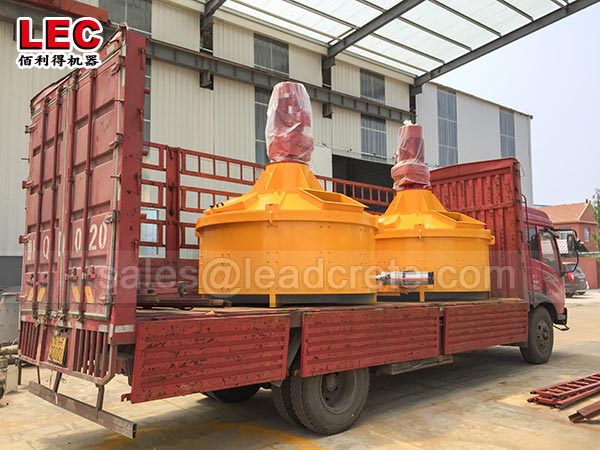 Self-loading concrete mixer